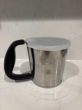 Oxo Stainless Steel Flour Sifter with Black Handle and White Lid